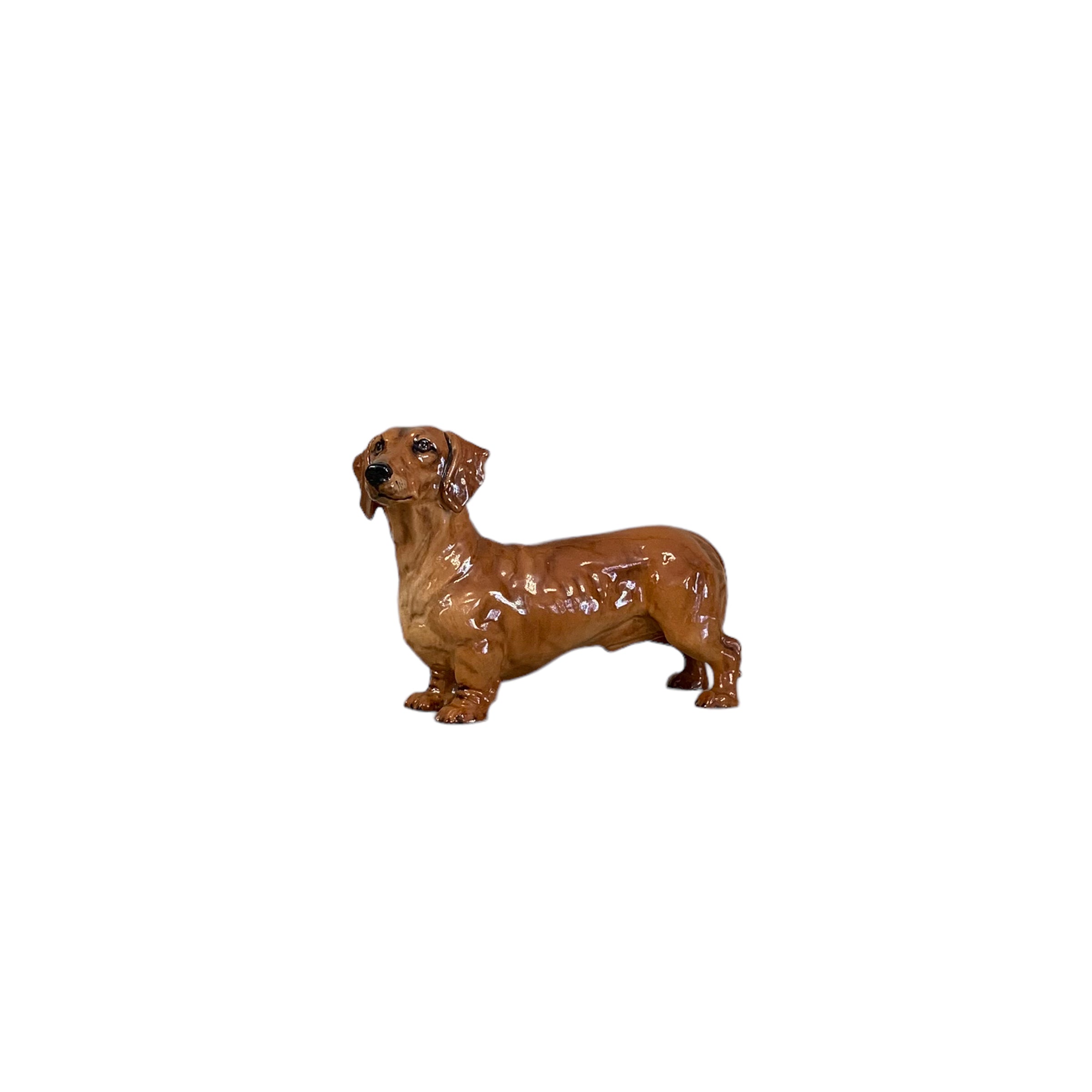 Perro firmado Royal Doulton. SXX (Valor unitario)