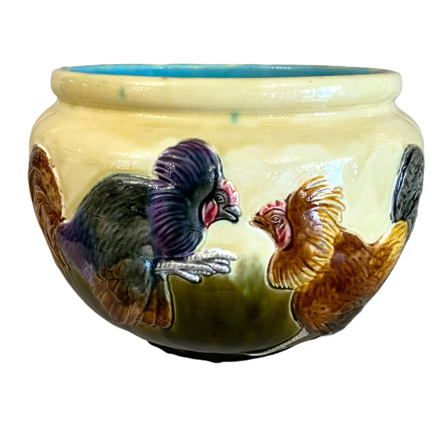 Jardinera de mayólica con motivos de gallos firmada Orchied France. SXIX