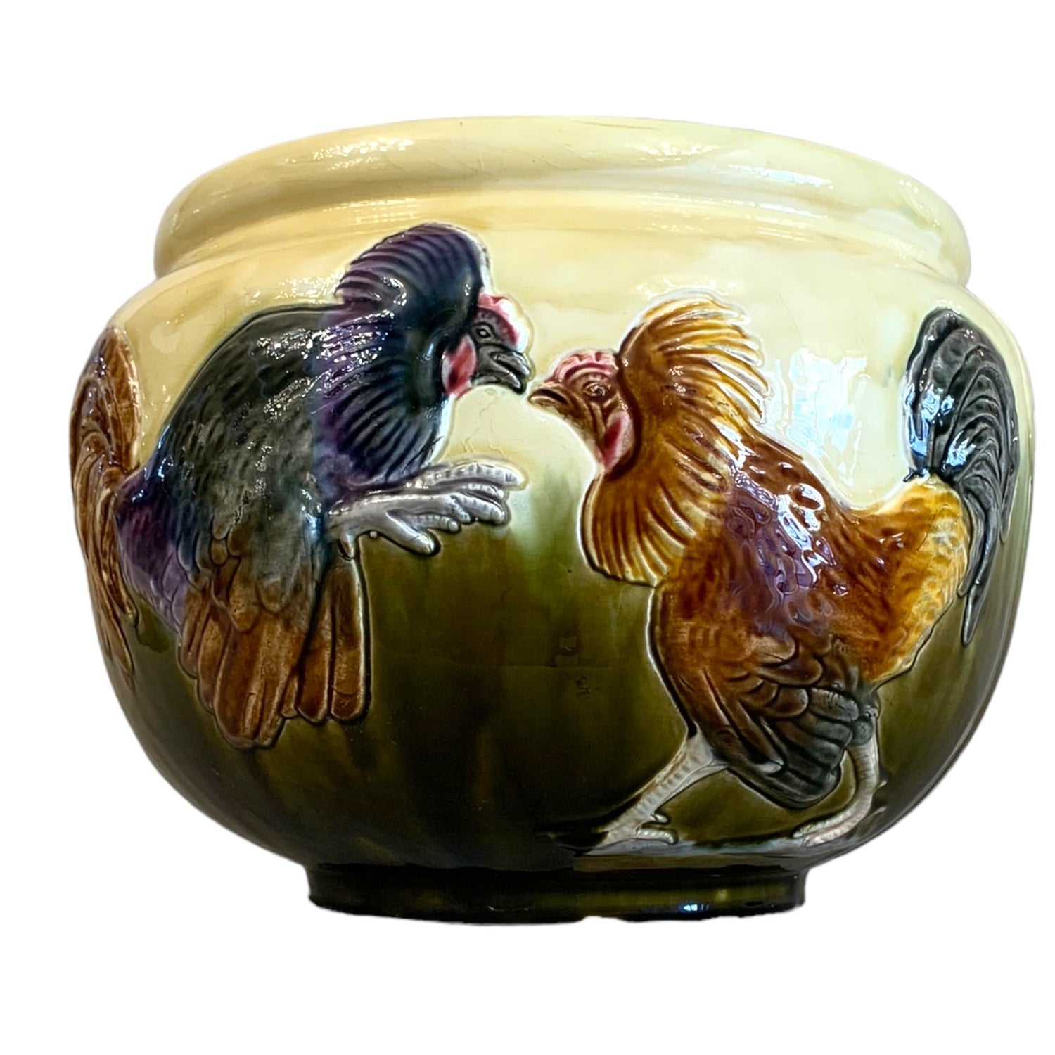Jardinera de mayólica con motivos de gallos firmada Orchied France. SXIX