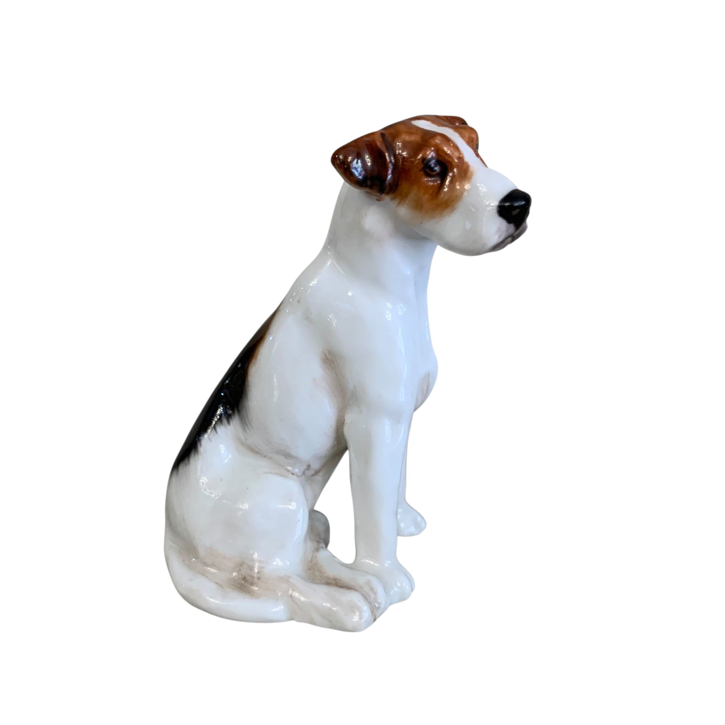 Perro miniatura porcelana inglesa Royal Doulton. SXX