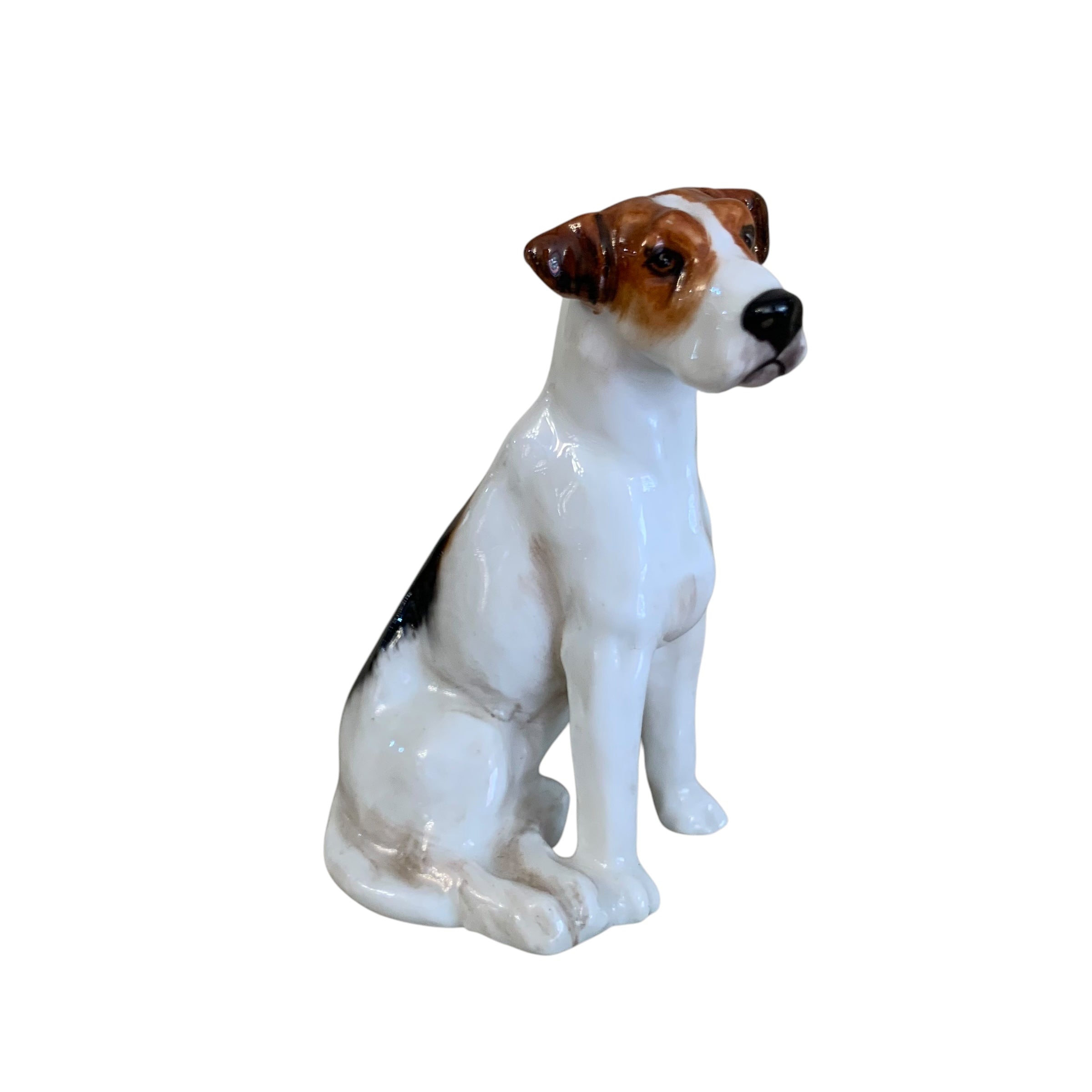 Perro miniatura porcelana inglesa Royal Doulton. SXX