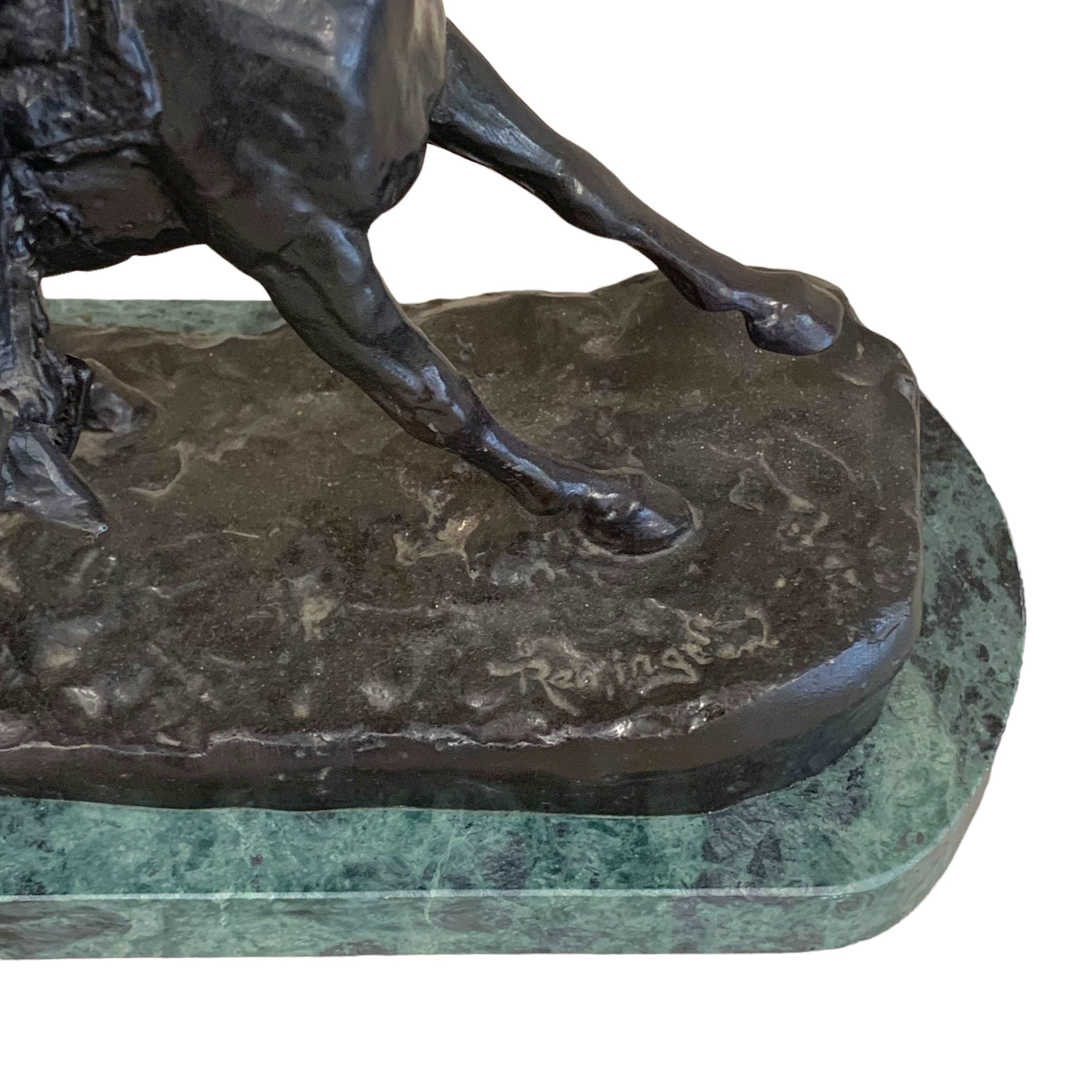 Escultura bronce "cowboy" firmado Frederick Remington. SXIX