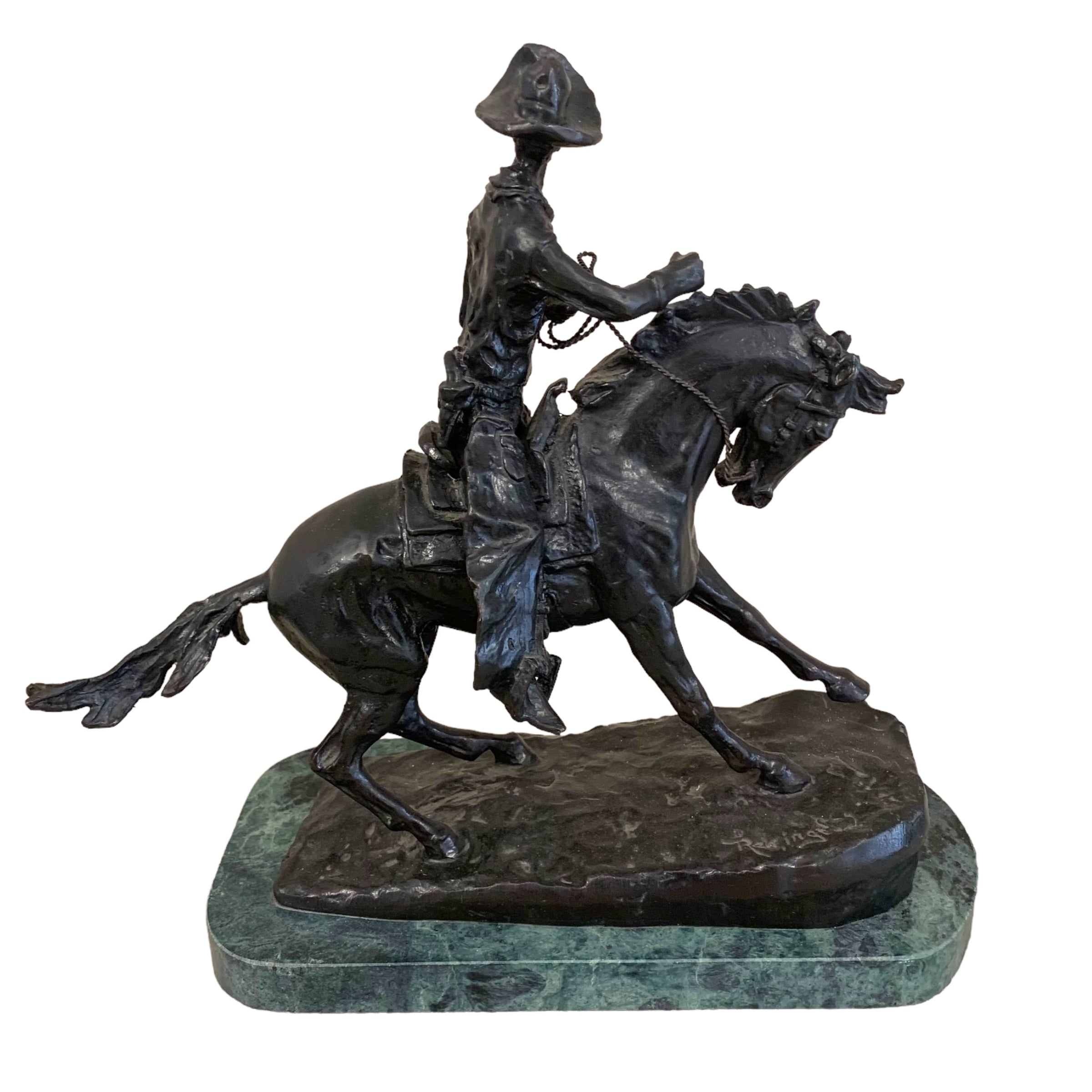 Escultura bronce "cowboy" firmado Frederick Remington. SXIX