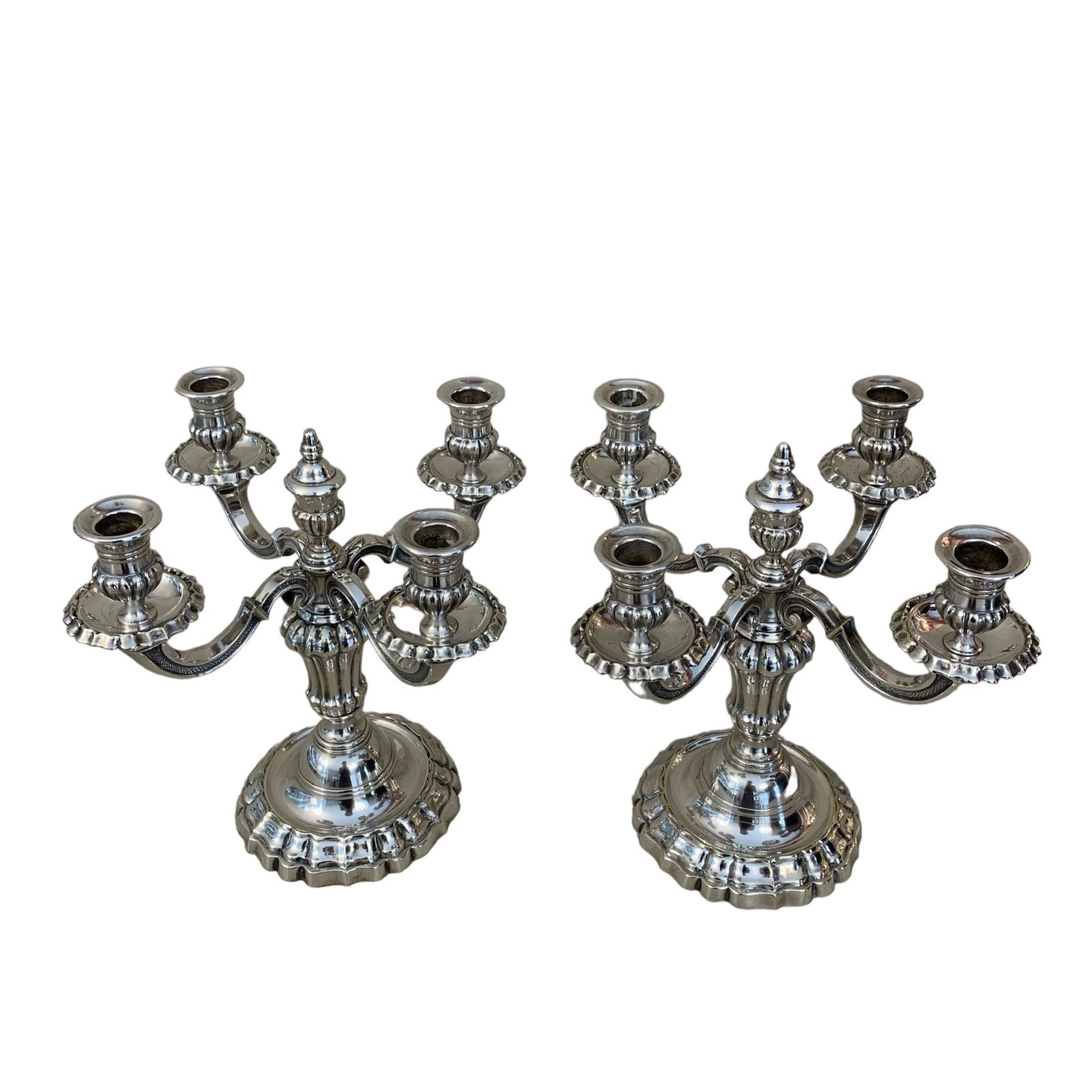 Par de candelabros plaqué Christofle. SXX