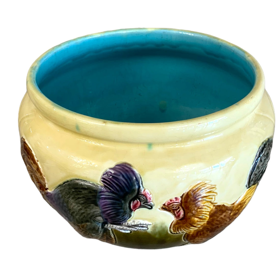 Jardinera de mayólica con motivos de gallos firmada Orchied France. SXIX