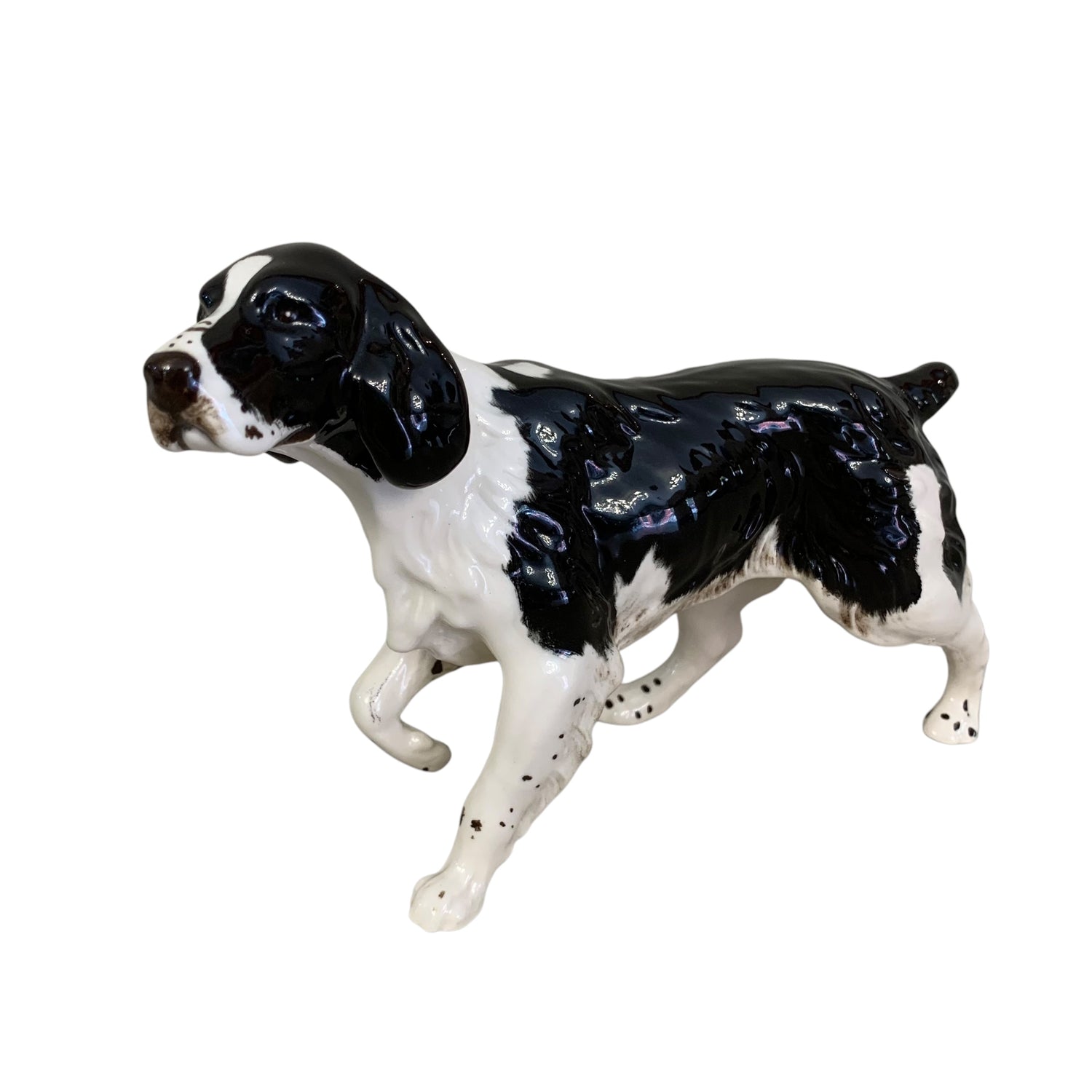Perro de porcelana inglesa Royal Doulton. SXX