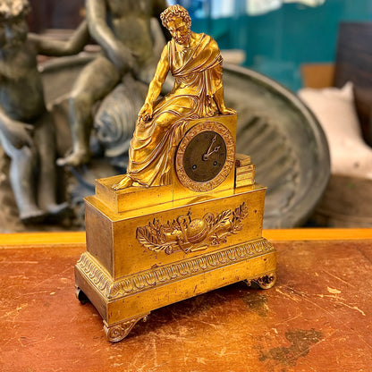 Reloj de bronce época Napoleón III mostrando a Homero. Francia SXIX