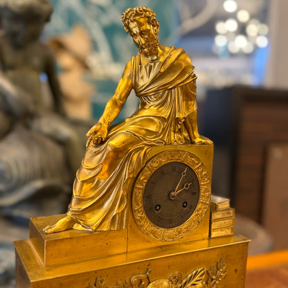 Reloj de bronce época Napoleón III mostrando a Homero. Francia SXIX